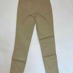 AERO women’s size 00 skinny beige khaki pants. New with tags.